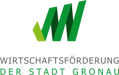 Logo der Wirtschaftsförderung der Stadt Gronau mit einem stilisierten grünen „W“ in verschiedenen Grüntönen. Unter dem Symbol steht der Schriftzug „Wirtschaftsförderung der Stadt Gronau“.